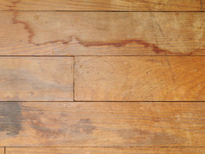 This laminate flooring shows signs of water staining.