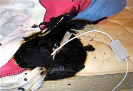 This electric blanket shorted out and caught fire, burning the bedding and mattress.  Its user barely escaped serious injury.