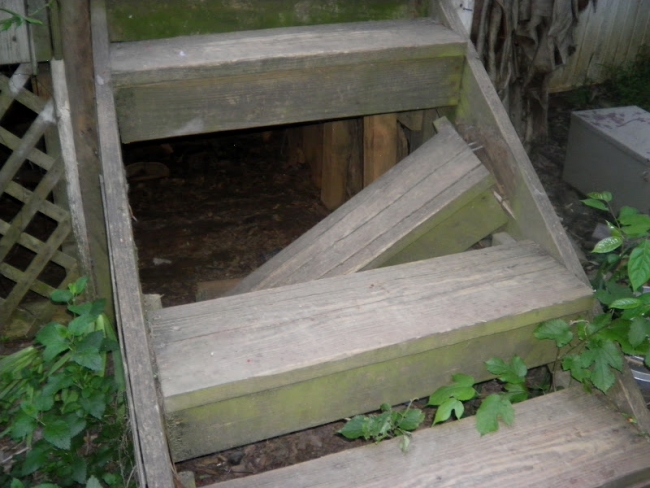 An inspector may choose to notify all parties of a hazard even as obvious as this broken porch step, just in case someone at the property isn't paying attention. 