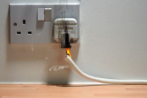 This faulty electrical outlet could start a house fire and may be categorized as an imminent hazard.