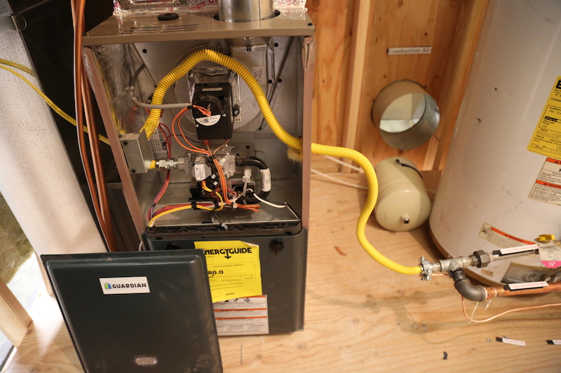 Observation - Flexible gas line should not be installed within the furnace cabinet